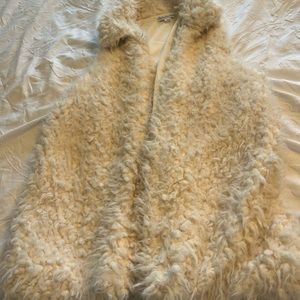 Cream colored fur vest